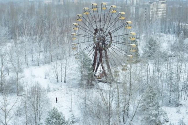 but-on-april-26-1986-an-explosion-inside-the-chernobyl-nuclear-power-plant-caused-flames-and-radioactive-debris-to-soar-through-the-air-right-over-pripyat-the-towns-49000-residents-were-evacuated
