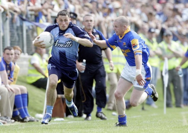 Alan Brogan of Dublin with Dermot Brady of Longford