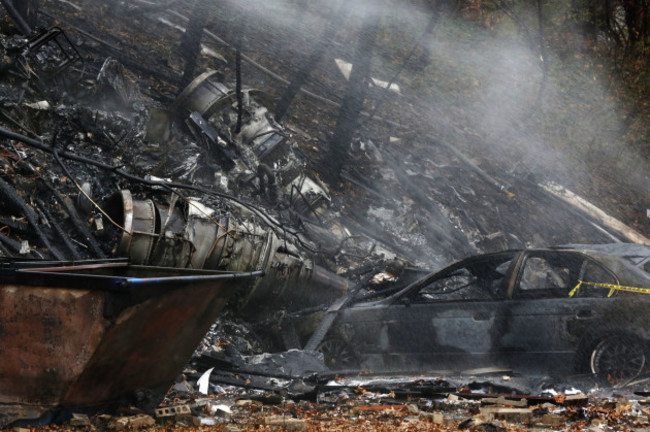 APTOPIX Plane Crash-Apartment Building