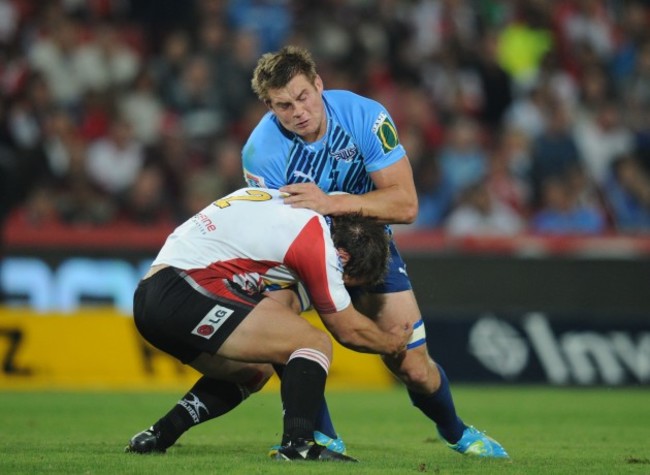 CJ Stander of the Bulls tackled by Callie Visagie of the Lions CJ Stander will be joining Munster 21/6/2012