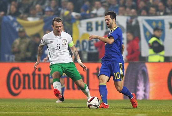 Glenn Whelan with Miralem Pjanic