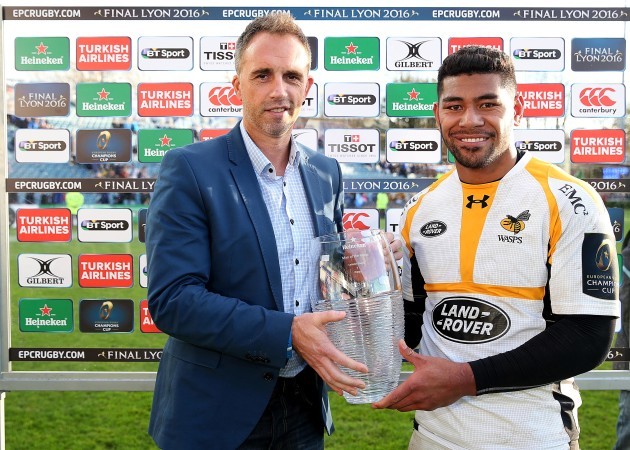 Charles Piutau receives the Man of the Match award from Karl Donnelly