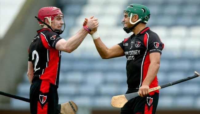 Keith Rossiter and Paul Roche celebrate at the end of the game