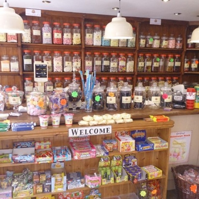 We stopped off at a proper old sweet shop on our drive up to Manchester. So many jars filled with lollies, reminds me of my lolly jar necklaces! #pennysweets #lollyshop #nostagia