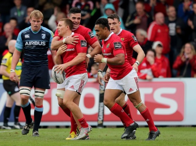 Andrew Conway celebrates his try with Jordan Coghlan, Shane Monahan and Francis Saili