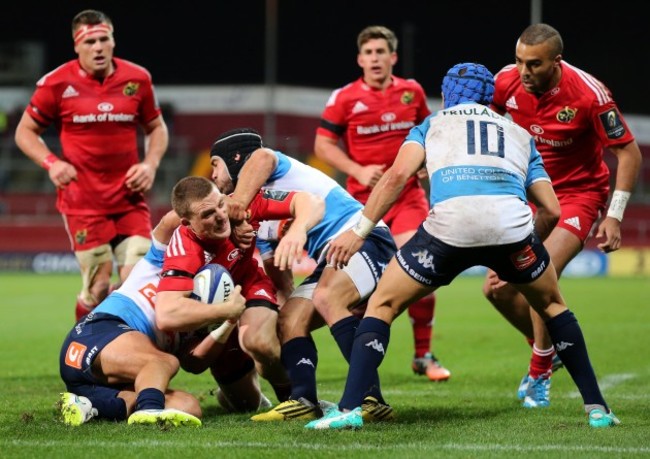 Andrew Conway is held up just short of the try line