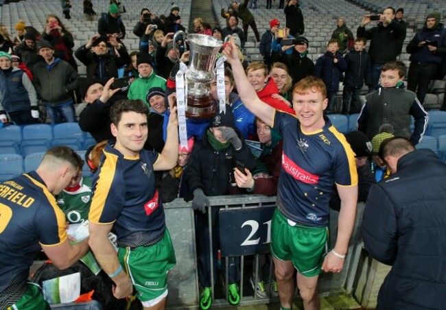 Paul Cribbin and Bernard Brogan celebrate with The Cormac McAnallen Cup