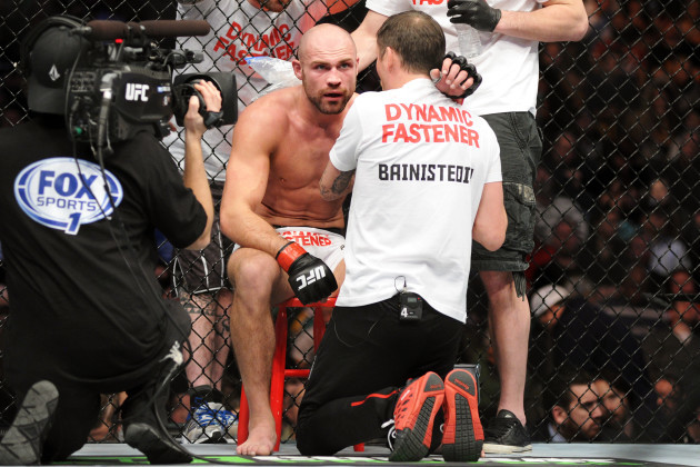 Cathal Pendred with John Kavanagh in between rounds