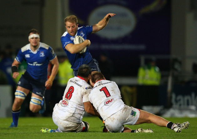 Luke Fitzgerald is tackled by Nick Williams and Kyle McCall