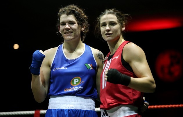 Katie Taylor with Shauna OÕKeefe at the end of their bout
