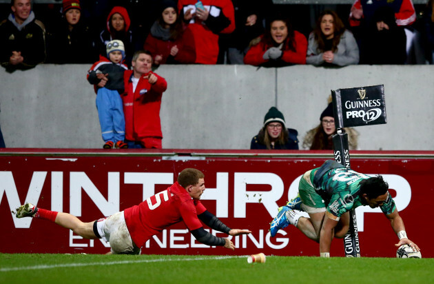 Bundee Aki scores his side's second try despite Andrew Conway