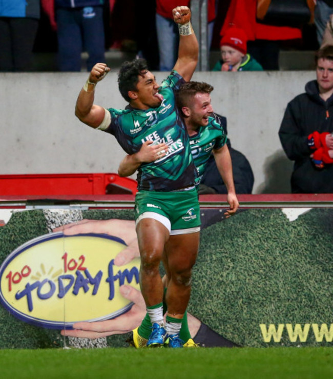 Bundee Aki celebrates scoring a try with Jack Carty