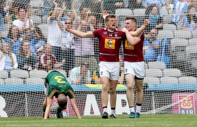 John Heslin celebrates scoring a late goal with Kieran Martin