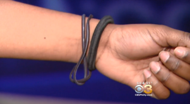 hair tie on guys wrist