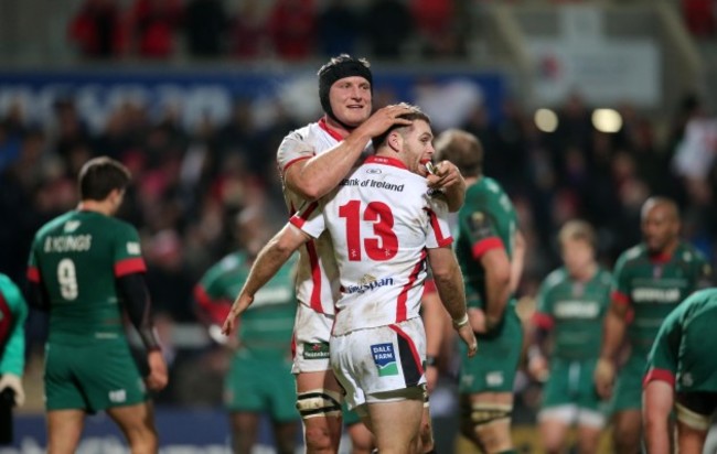 Darren Cave celebrates his second try with Franco Van Der Merwe