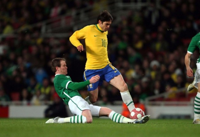 Glenn Whelan with Kaka