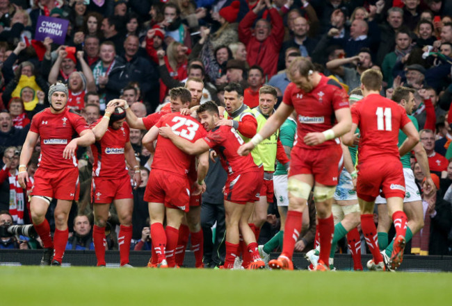 The Wales team celebrate Scott William's try