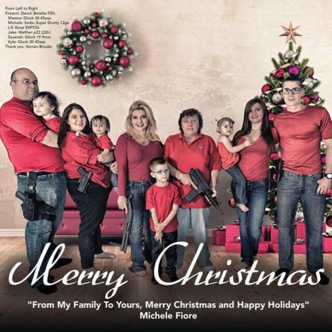 US politician posts Christmas portrait showing family posing with guns