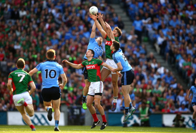 Aidan OÕShea with Denis Bastick and Brian Fenton