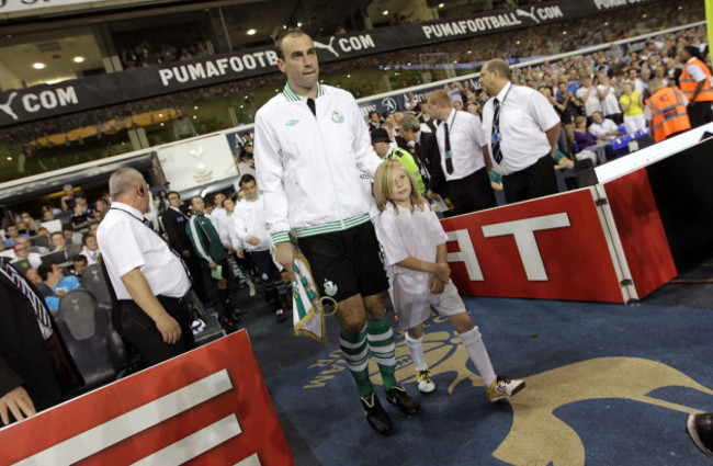 Dan Murray leads the Rovers team out