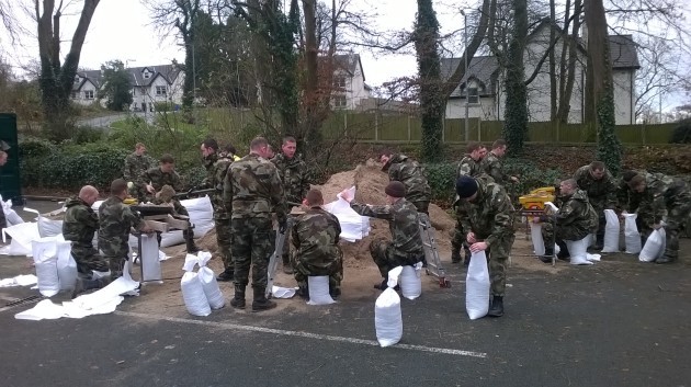 storm desmond members of the defence forces help o