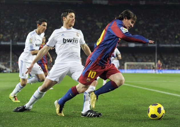 Lionel Messi and Xavi Alonso 29/11/2010