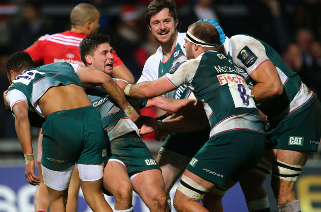 Ben Youngs celebrates scoring a try with teammates