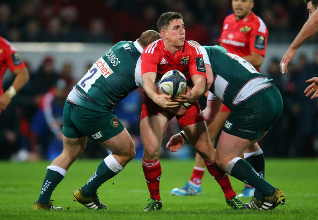 Ian Keatley is tackled by Tom Youngs and Dan Cole