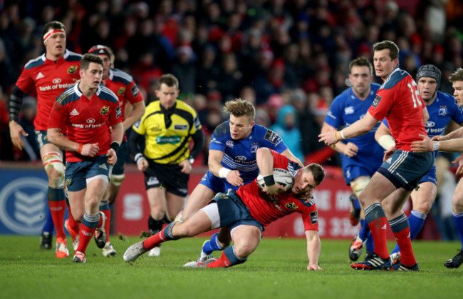 Ian Keatley tackled by Ian Madigan