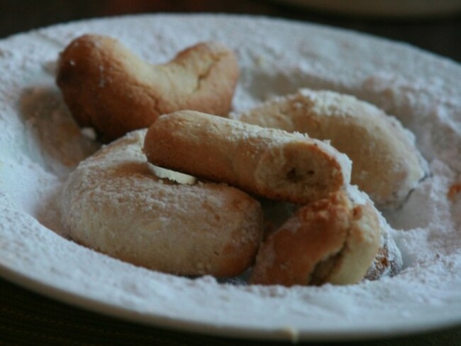 austria-little-vanilla-crescent-cookies-called-vanillekipferl-adorn-bakeshop-windows-and-family-kitchens-throughout-the-holiday-season-in-austria-theyre-similar-to-a-shortbread-cookie-and-are-made-with-vanilla-and-nuts