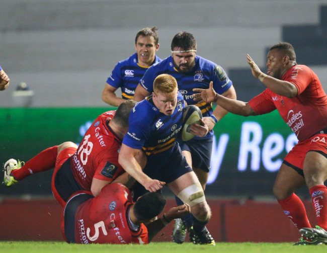 LeinsterÕs Tom Denton is tackled by ToulonÕs Levan Chilachava Romain Taofifenua and Steffon Armitage