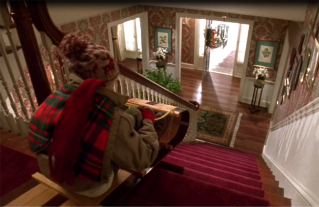 home-alone-macaulay-culkin-sled-stairs