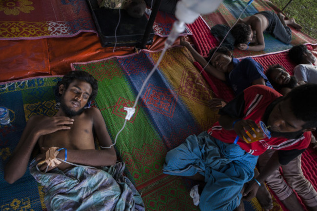 Indonesia. Rohingya refugees are rescued at sea