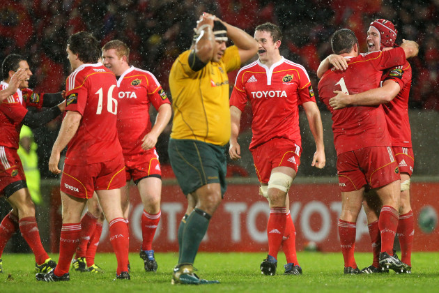Munster players celebrate at the final whistle