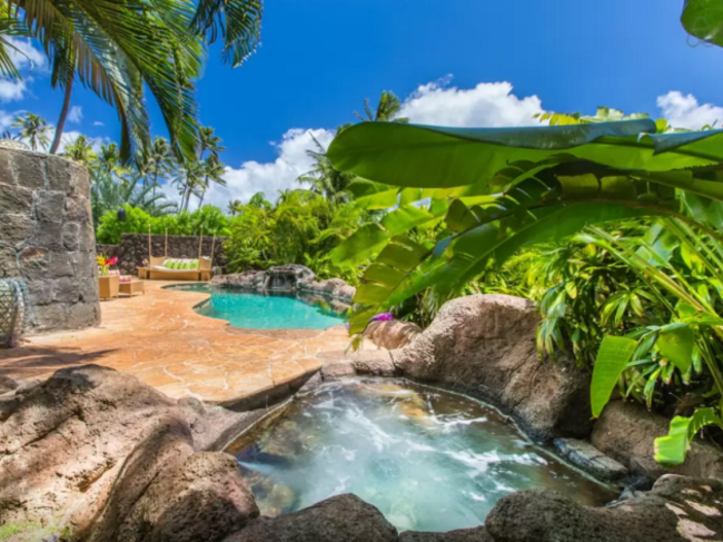 for-that-price-tag-guests-enjoy-a-hot-tub-pool-and-a-five-minute-drive-to-the-famous-waikiki-beach-the-house-has-three-bedrooms-and-accommodates-up-to-six-people