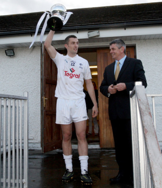 Ciaran Kelly lifts the trophy