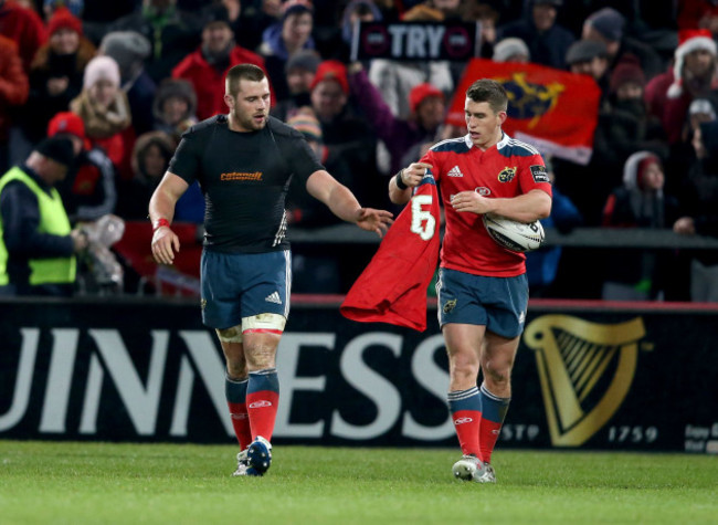 Ian Keatley returns the jersey to CJ Stander after scoring