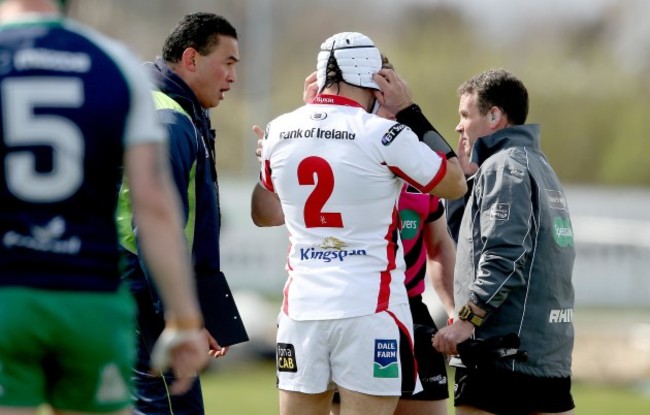 Pat Lam and Rory Best speak to Nigel Owens at the start of the game