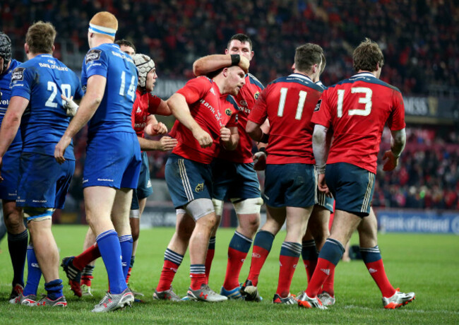 Andrew Conway celebrates his try with Paddy Butler