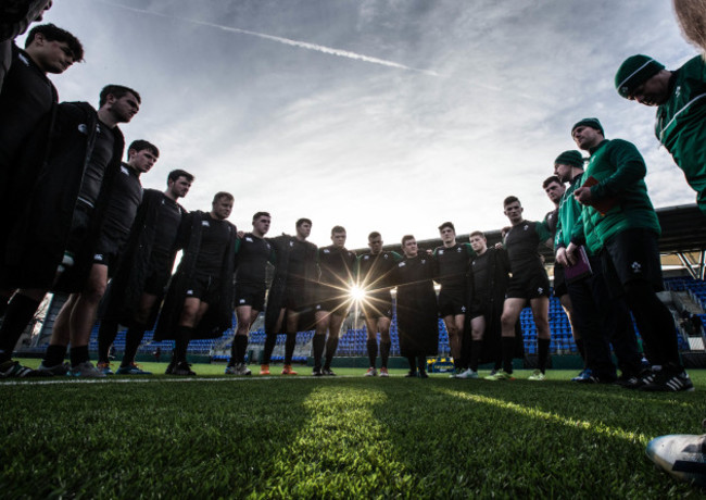 Ireland management speak to the players after the match