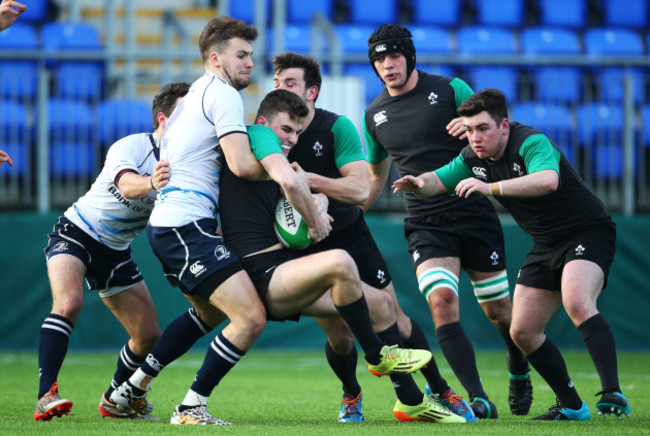 Shane Daly is tackled by Harrison Brewer