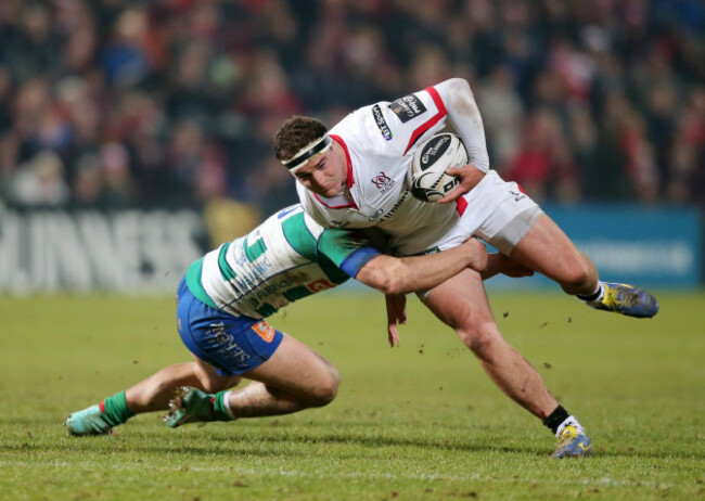 Rob Herring is tackled by Enrico Bacchin