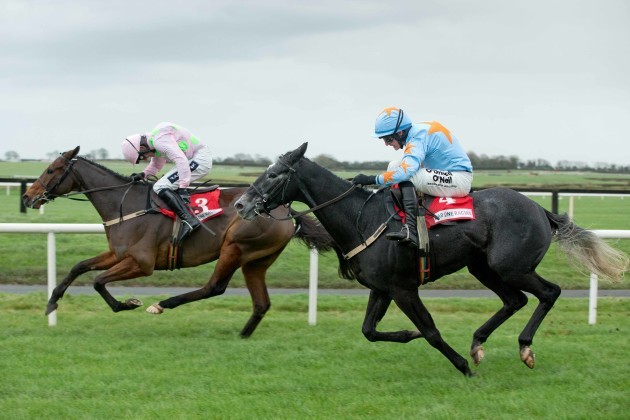 Ruby Walsh on Long Dog holds off the challenge from Paul Townsend on Bachasson to win