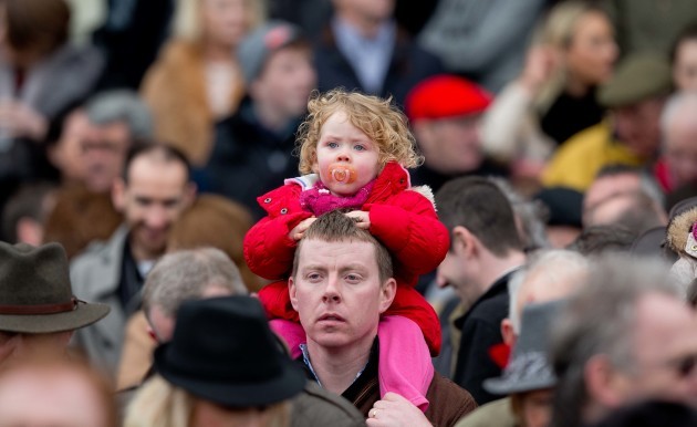 A young child gets a better view at Leopardstown