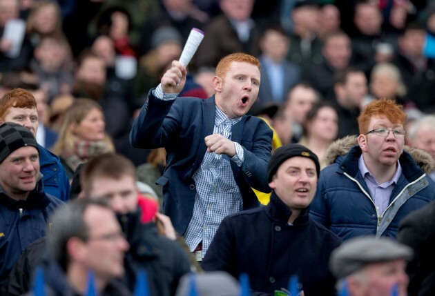 A punter cheers on Jack Kennedy to victory