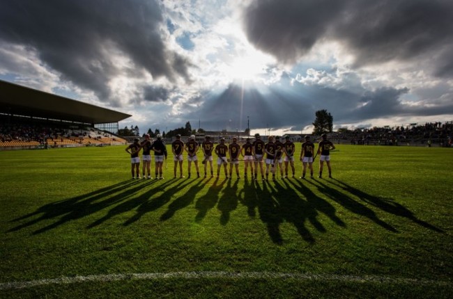 Wexford players stand for the National Anthem