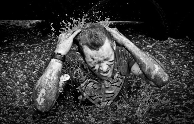 Pictured today is Samuel Smith battling it through the gruelling obstacles at the Tough Mudder event