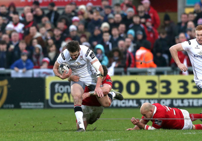 Stuart McCloskey tackled by Jack O'Donoghue