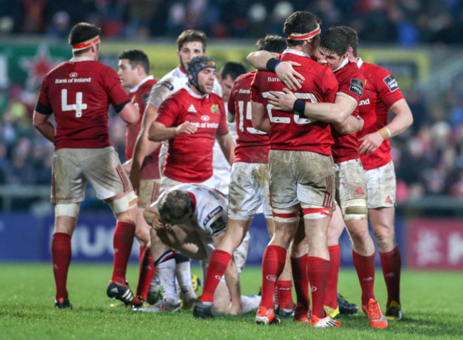 Munster players celebrate at the final whistle