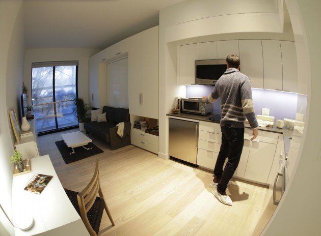 with-this-amount-of-space-you-cant-really-expect-a-full-kitchen-instead-the-kitchens-are-more-like-kitchenettes-the-refrigerator-is-tiny-and-theres-only-a-two-burner-electric-stove-and-no-oven-there-is-however